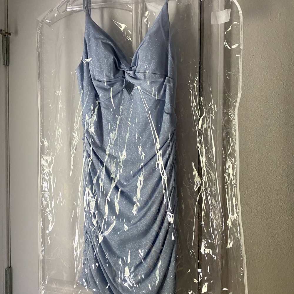 Alyce Paris dress. Size 4. Like new. Worn once. Light blue with sparkles.